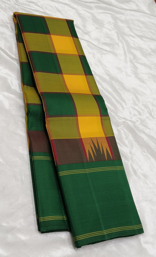 Kancheepuram silk saree rust wine border with temple style detailing