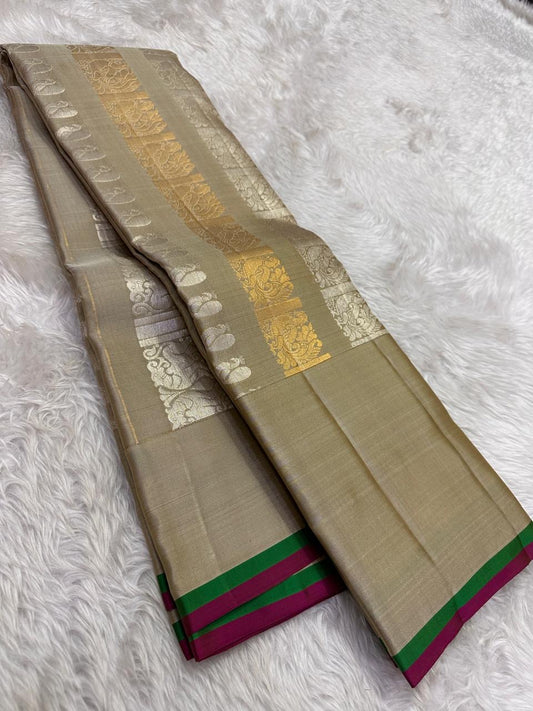 Kancheepuram silk saree gold body with dual zari panel detail