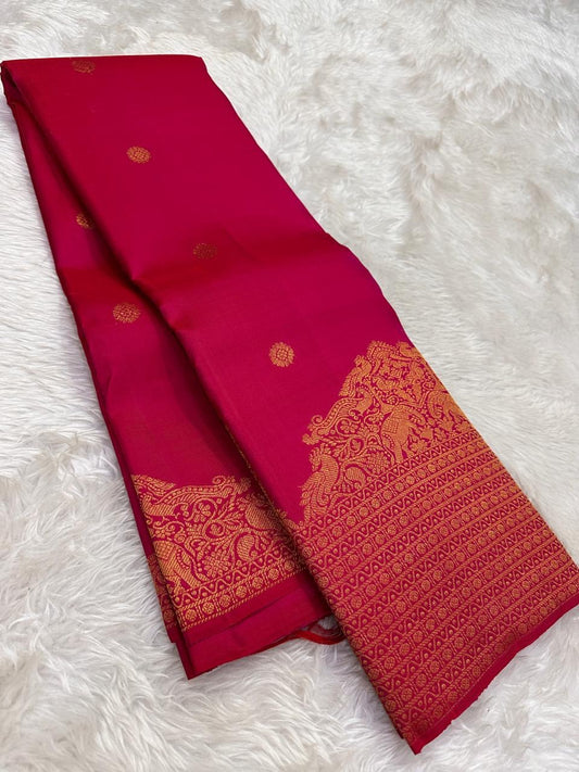 kanchipuram silk saree raspberry red pink with gold border draped view
