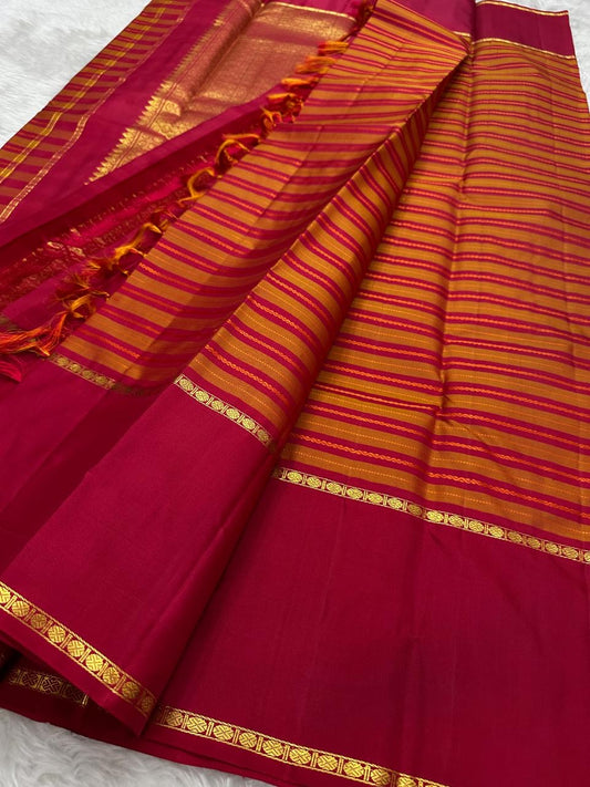 Turmeric Gold Handwoven Pure Silk Kanjipuram Saree with Rettapet Raspberry Pink Border