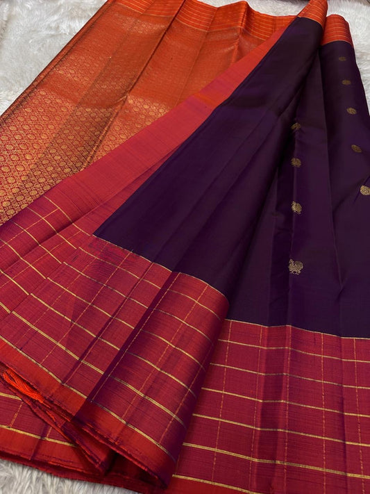 Kanjivaram silk saree deep plum silk with peacock butta detail closeup