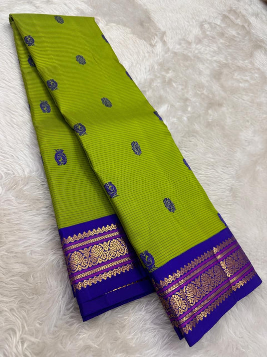 Kancheepuram silk saree green linear texture with violet border
