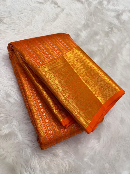 Kanjivaram silk saree bright orange silk body detail with sheen