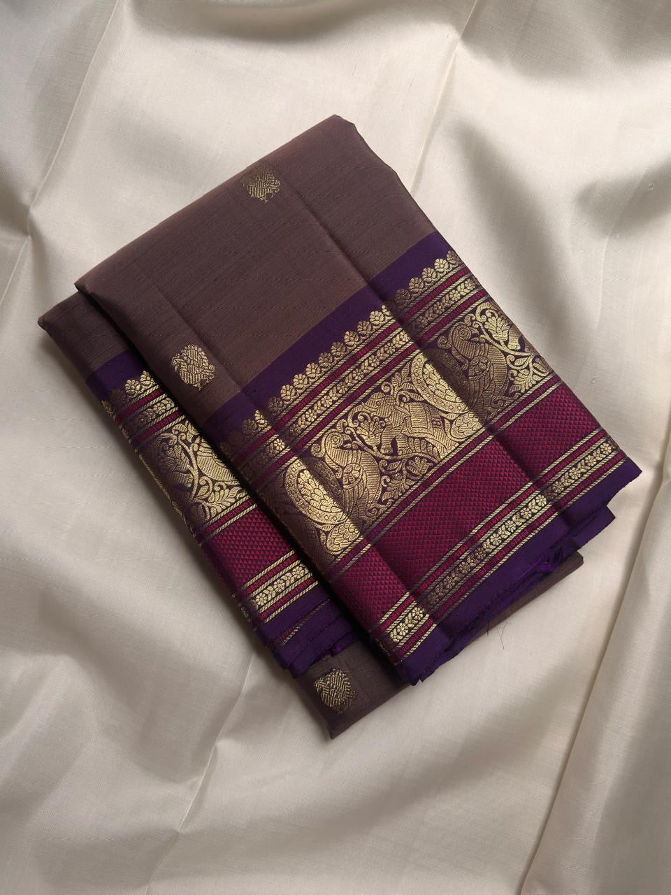 Muted Taupe Brown Handwoven Pure Silk Kanchi Pattu Butta Saree with Kathiripoo Mayil Gold Zari Border
