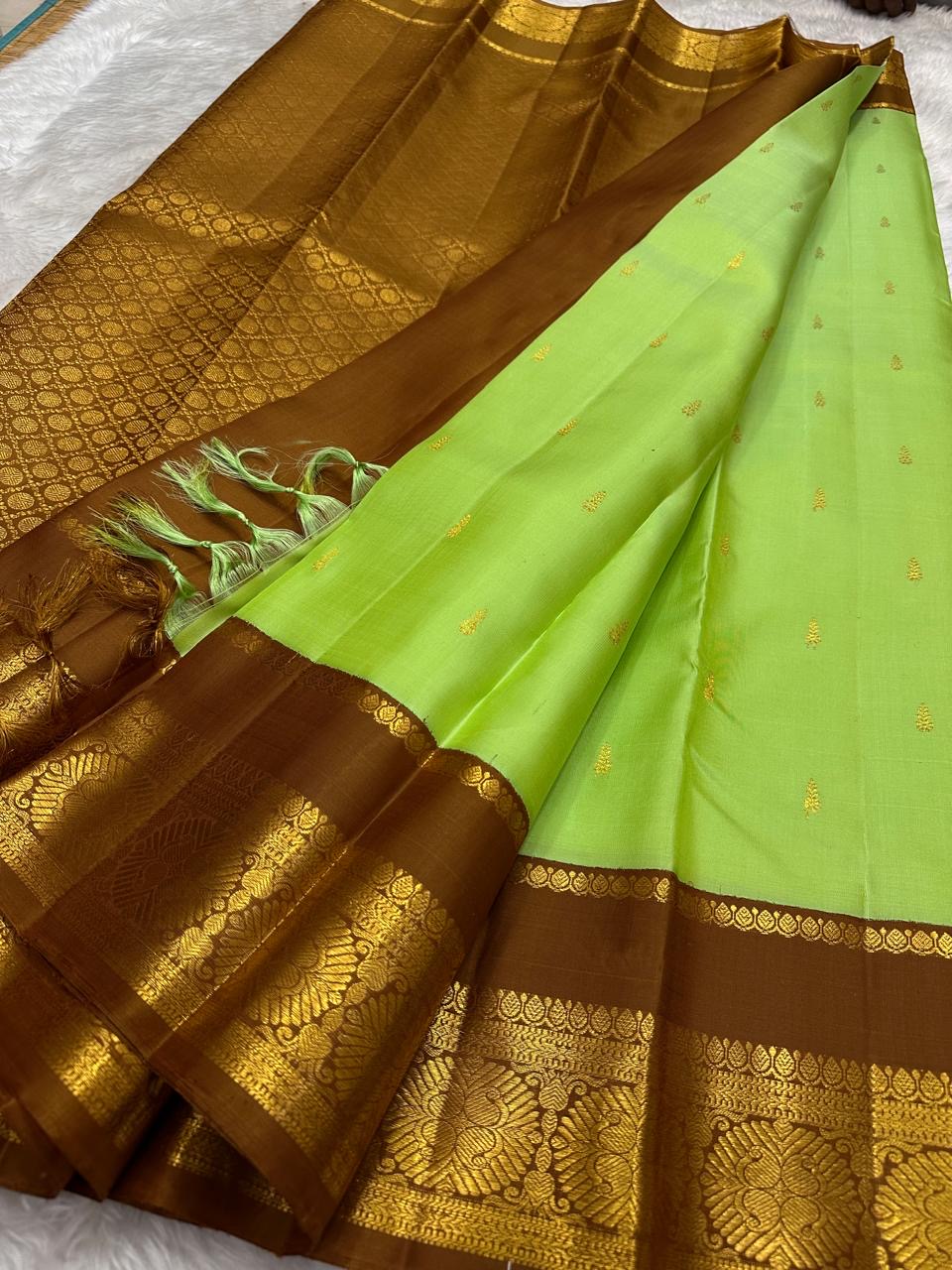 Kili Pachai Kanchipuram Korvai saree with bold Kamalam thanga zari medallions