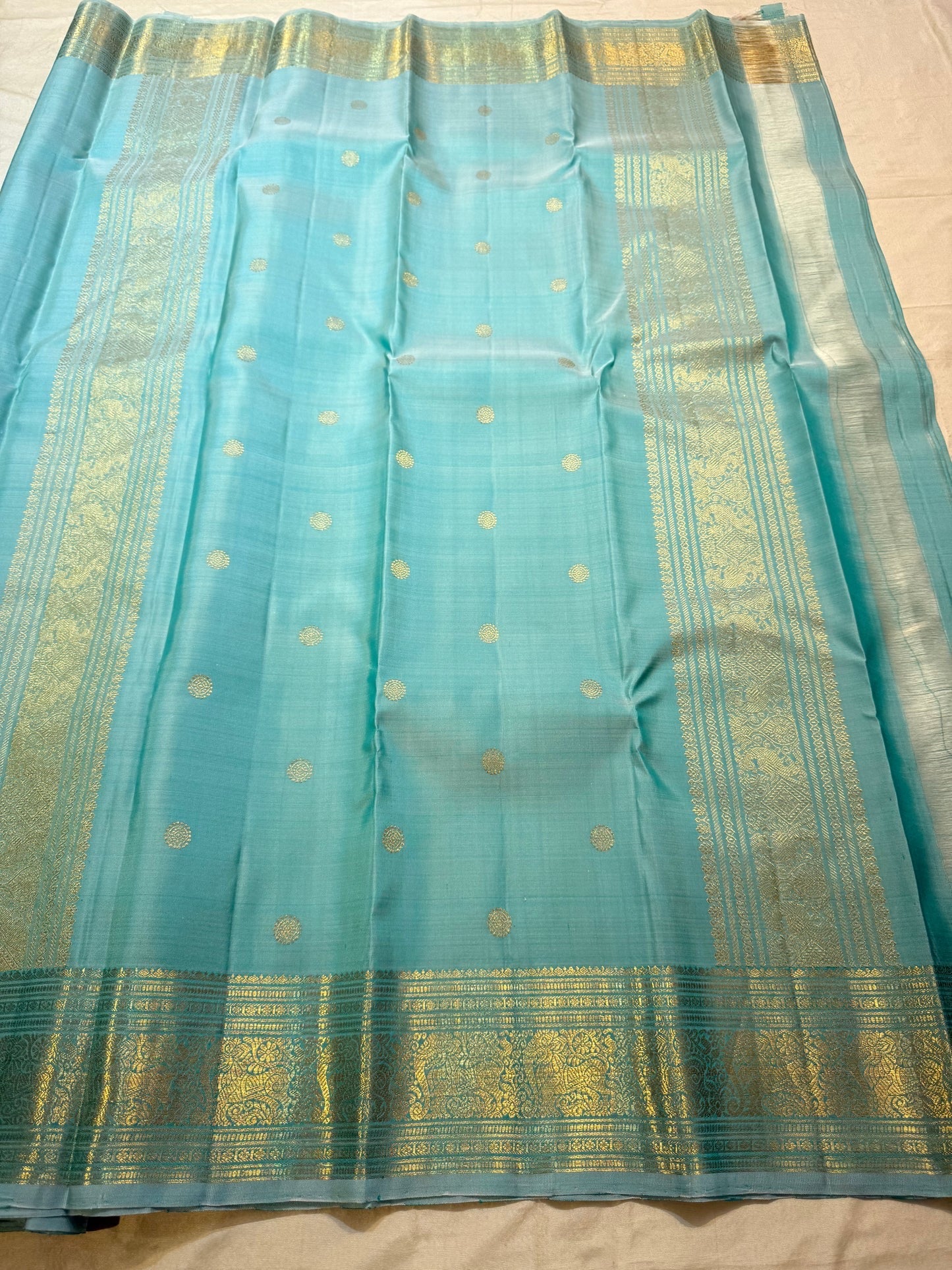 Sea Glass Aqua Handwoven Pure Silk Kanchi Pattu Saree with Antique Gold Zari Buttas and Ornamental Border