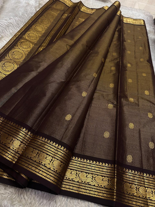 Cinnamon brown Kanjipuram silk saree — gold zari border close-up detail