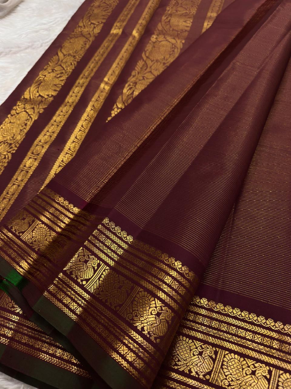 Full view of lightweight maroon Kanjivaram vairaoosi pure silk saree with peacock butta and self border — Idam Living