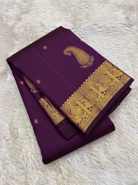 Grape purple Kanjeevaram silk saree body close-up showing Maanga paisley antique gold zari butta motifs