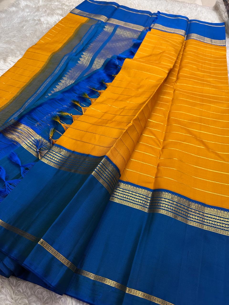 Marigold Yellow Handwoven Pure Silk Kanjeevaram Korvai Saree with Royal Blue Border and Veldhari Zari