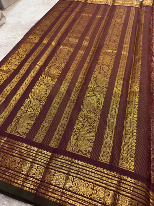 Rich dense gold zari pallu of handwoven maroon Kanjivaram lightweight silk saree — Idam Living