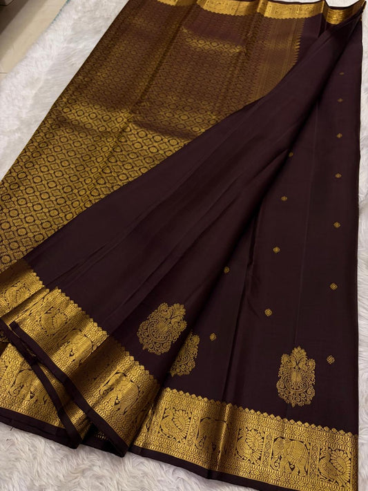 Kanchipattu silk saree in deep espresso brown with yaanai mayil motif border Mayil Butta weave traditional zari detail