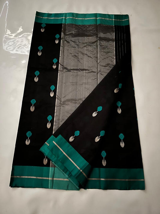 Black Pattu Silk Chanderi saree with peacock-teal borders and silver-toned pallu