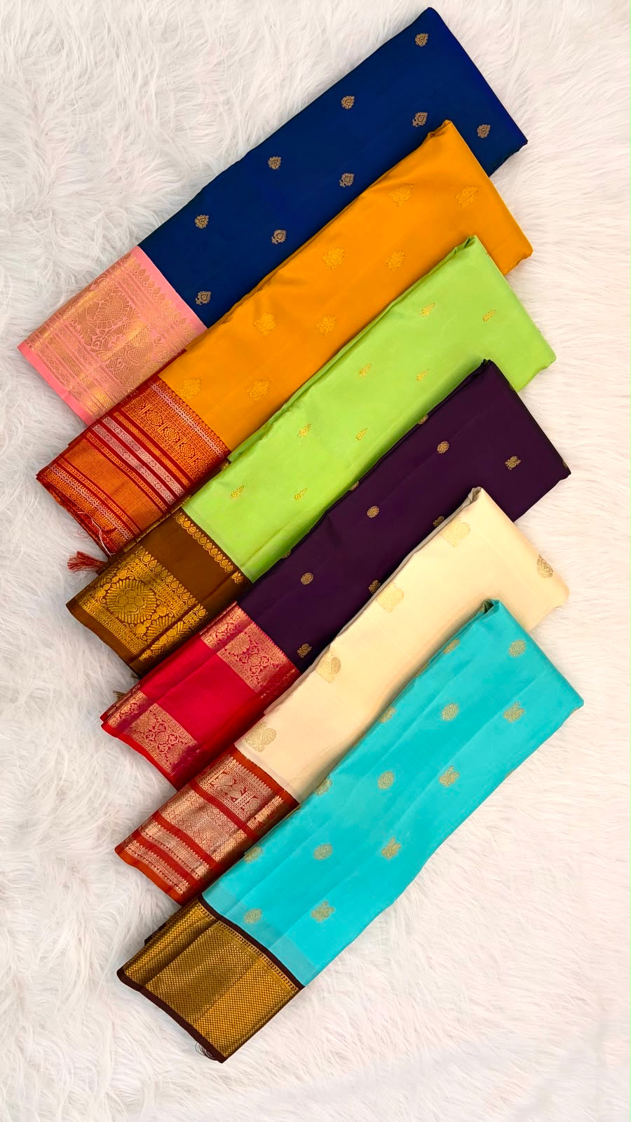 Milk White and Arakku Red Handwoven Pure Silk Kancheepuram Saree with Mayil Chakram Zari Butta and Varisaipet Border