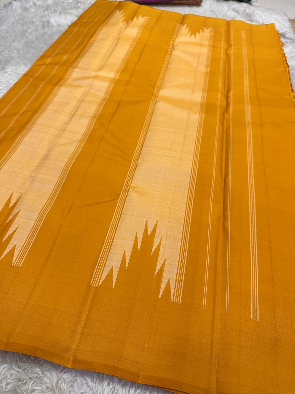 Full spread mustard and beige Pure Kanchipuram Silk Saree with long vertical stripes and temple motif border panels