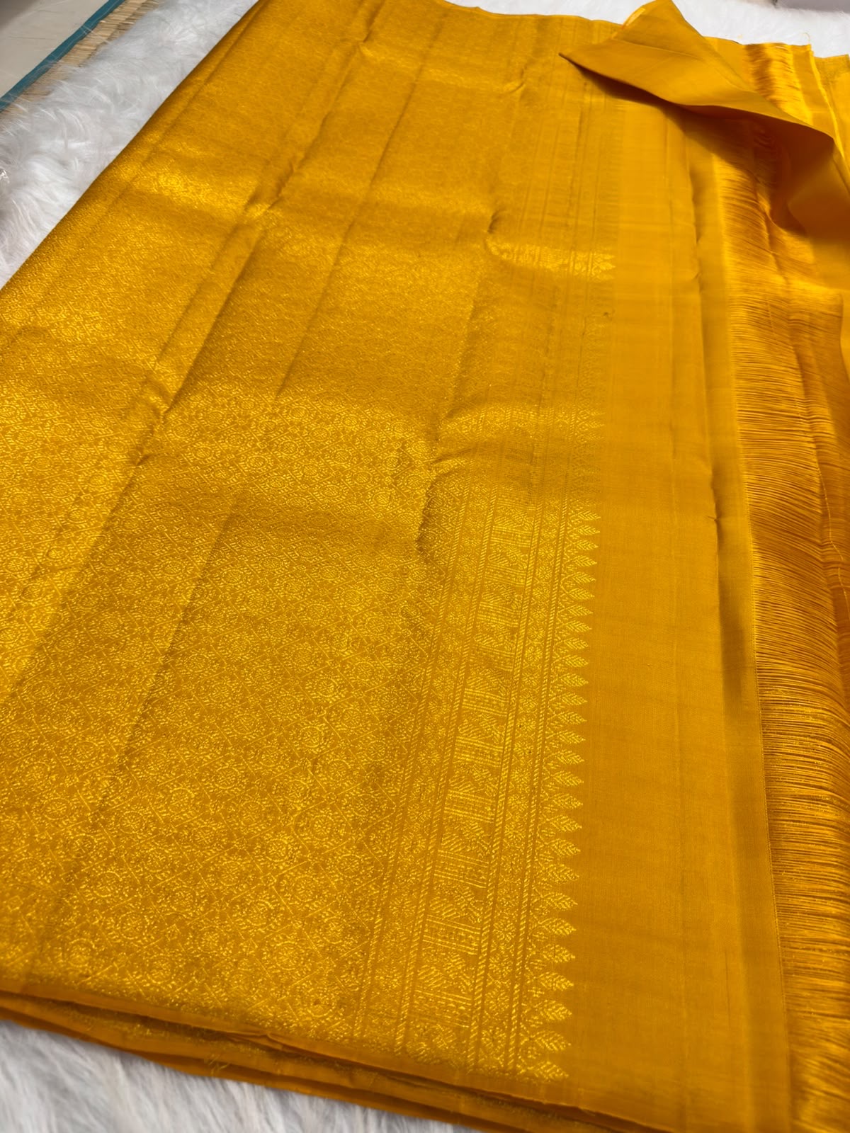 Canary Yellow Kanjeevaram silk saree pure silk and Silk Mark certified detail, handwoven in Kunnam village