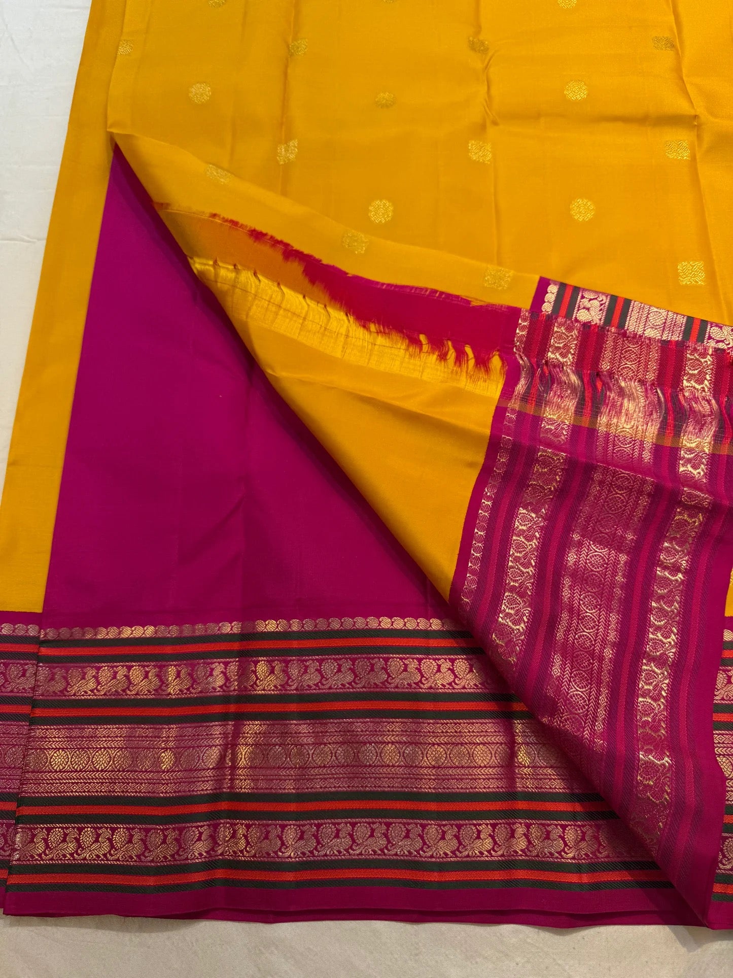 Mustard Yellow Handwoven Pure Silk Kanchipuram Saree with Pink Varisaipet Border