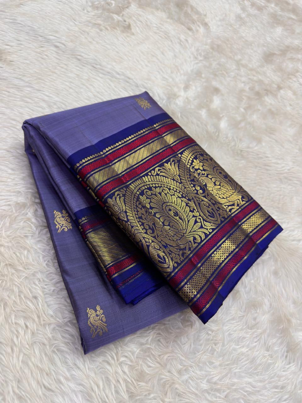 Mysterious purple Kanchipattu saree with traditional zari pallu detail – Idam Living