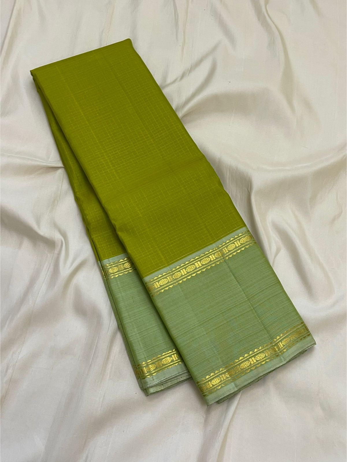 Full view of olive green handwoven Kanchipuram pure silk saree with zari kattam body — Idam Living