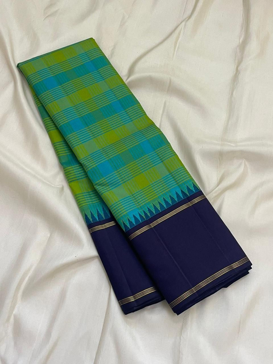 Green Teal Paalum Pazhamum Kanjeevaram Silk Saree with Pillayar Reku and Navy Border