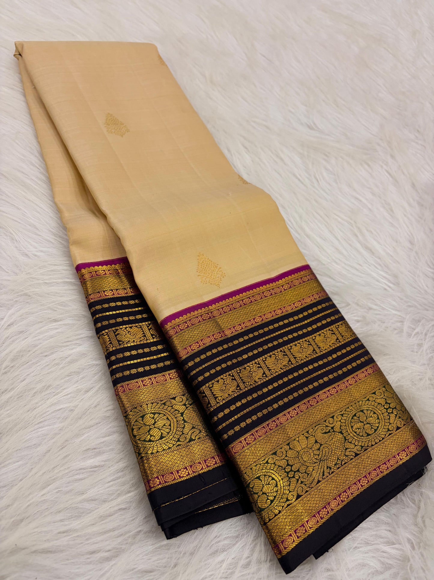 Pale Sand Ivory Kanjivaram Saree — deep navy Korvai border with gold zari floral medallions