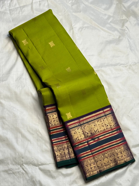 Parrot Green Handwoven Pure Silk Kanchipuram Saree with Navy Rettapet Border