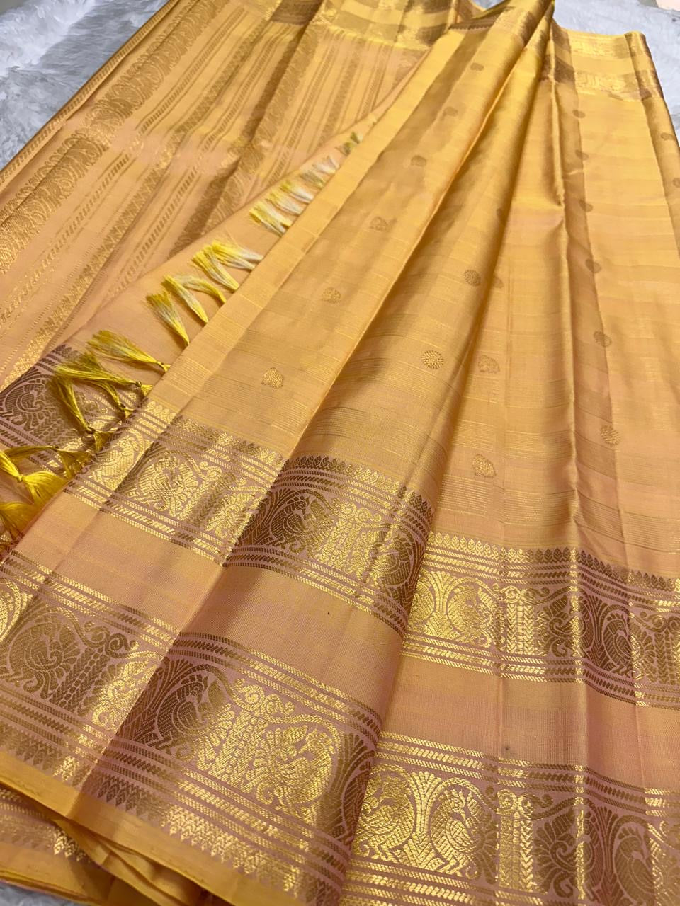 Peach Handwoven Pure Silk Kancheepuram Saree with Rettapet and Peacock Border