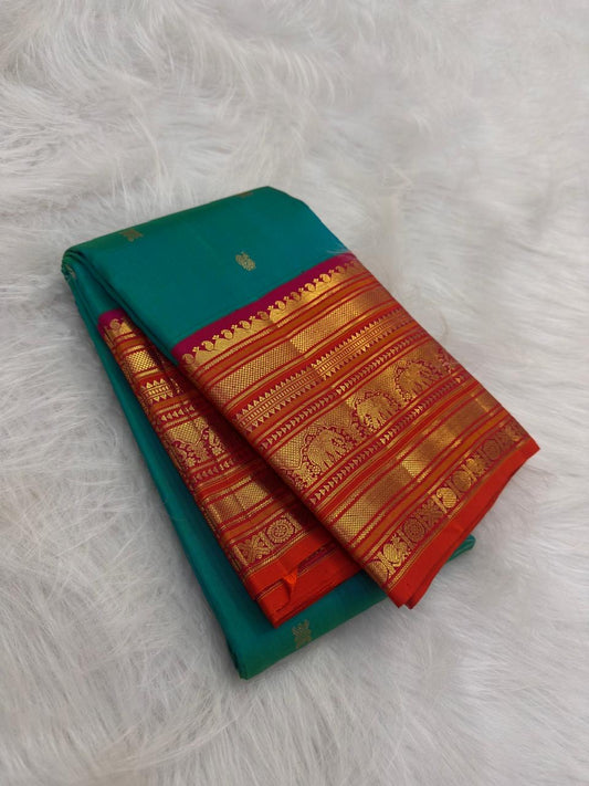 Peacock Teal KanchiPattu silk saree with vermilion Varisaipet elephant zari border — Idam Living