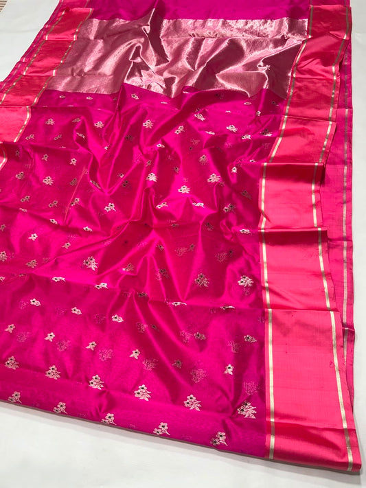 Bright pink Chanderi silk body close-up showing silver floral sprigs