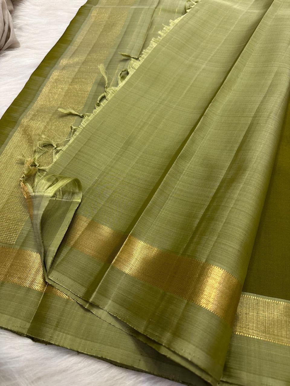 Olive Green Handwoven Pure Silk Kancheepuram Saree with Plain Body and Sage Green Zari Border