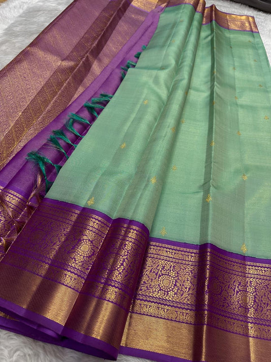 Pastel Mint Green and Royal Orchid Purple Handwoven Pure Silk Kanchipuram Saree with Vairaoosi Korvai Border and Mayil Chakram Butta