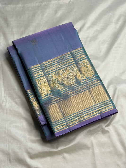 Close-up of rare Gandaberunda and winged horse gold zari buttas on Kanjivaram silk saree body