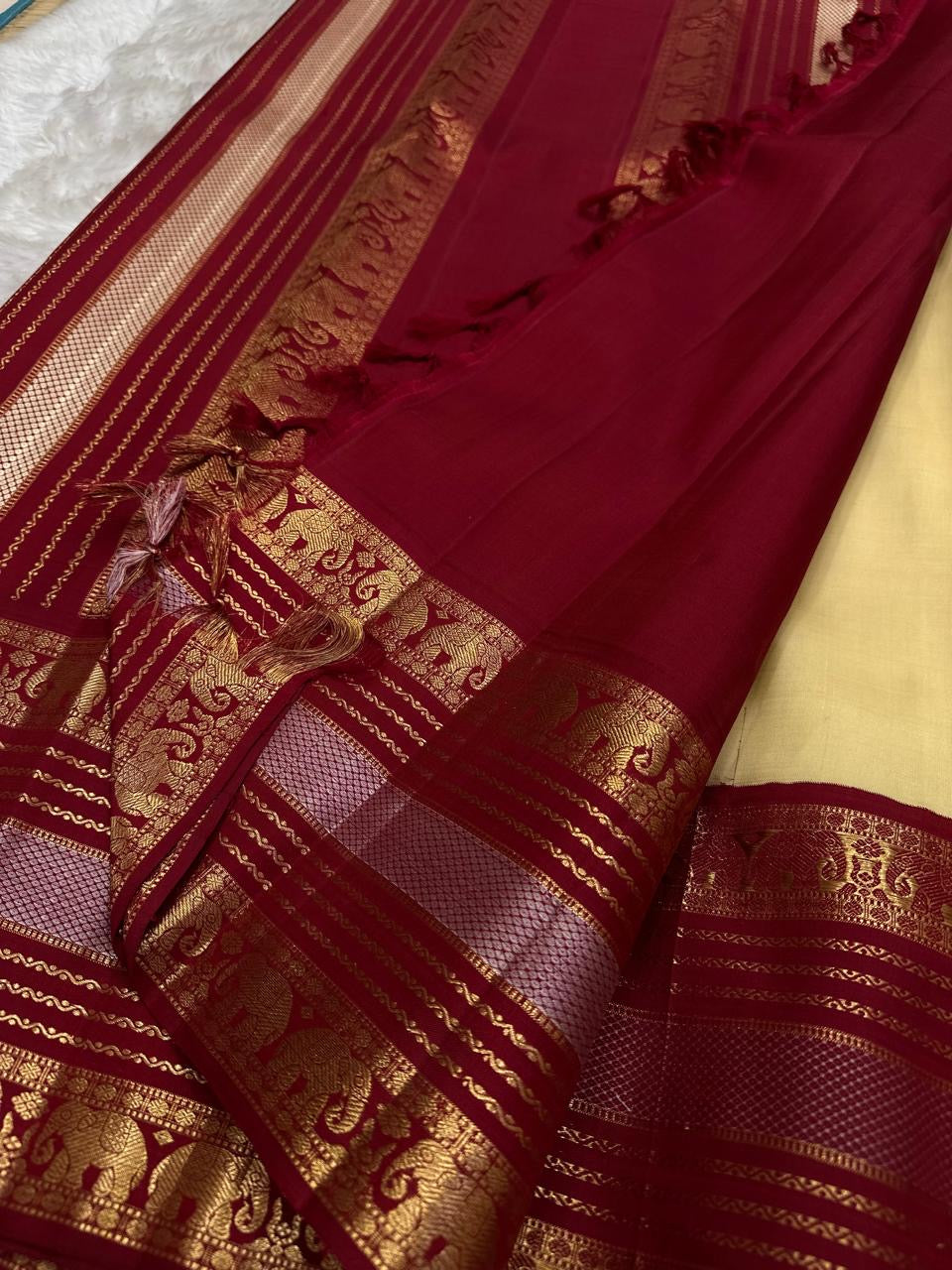 Ivory Kanchipuram Korvai silk saree, elephant buttas with Varisaipet zari border and grand pallu
