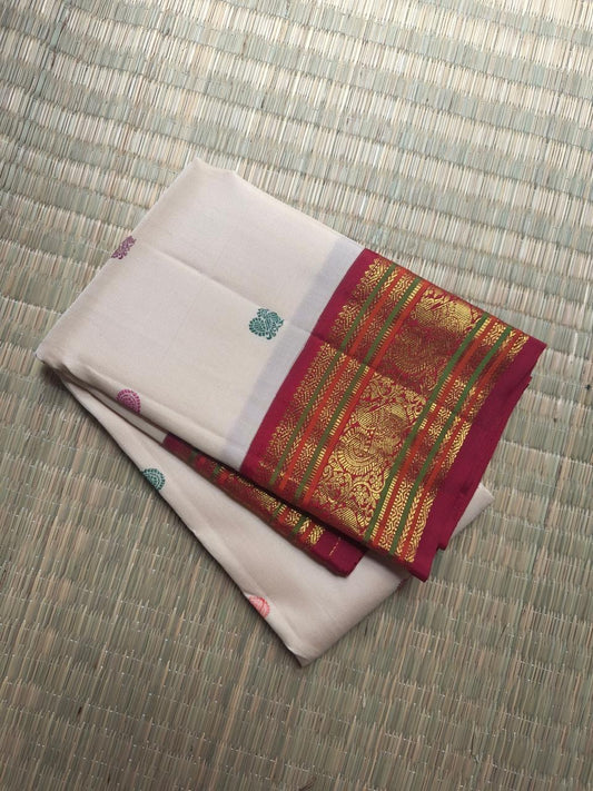Ivory Kancheepuram Korvai silk saree, floral buttas with Varisaipet zari border and grand pallu