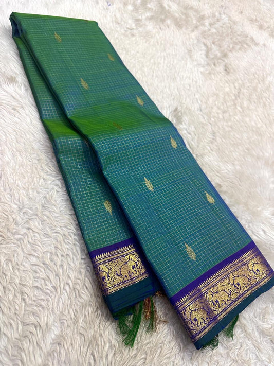 Blue green Kanjivaram silk saree with traditional antique gold grid detailing
