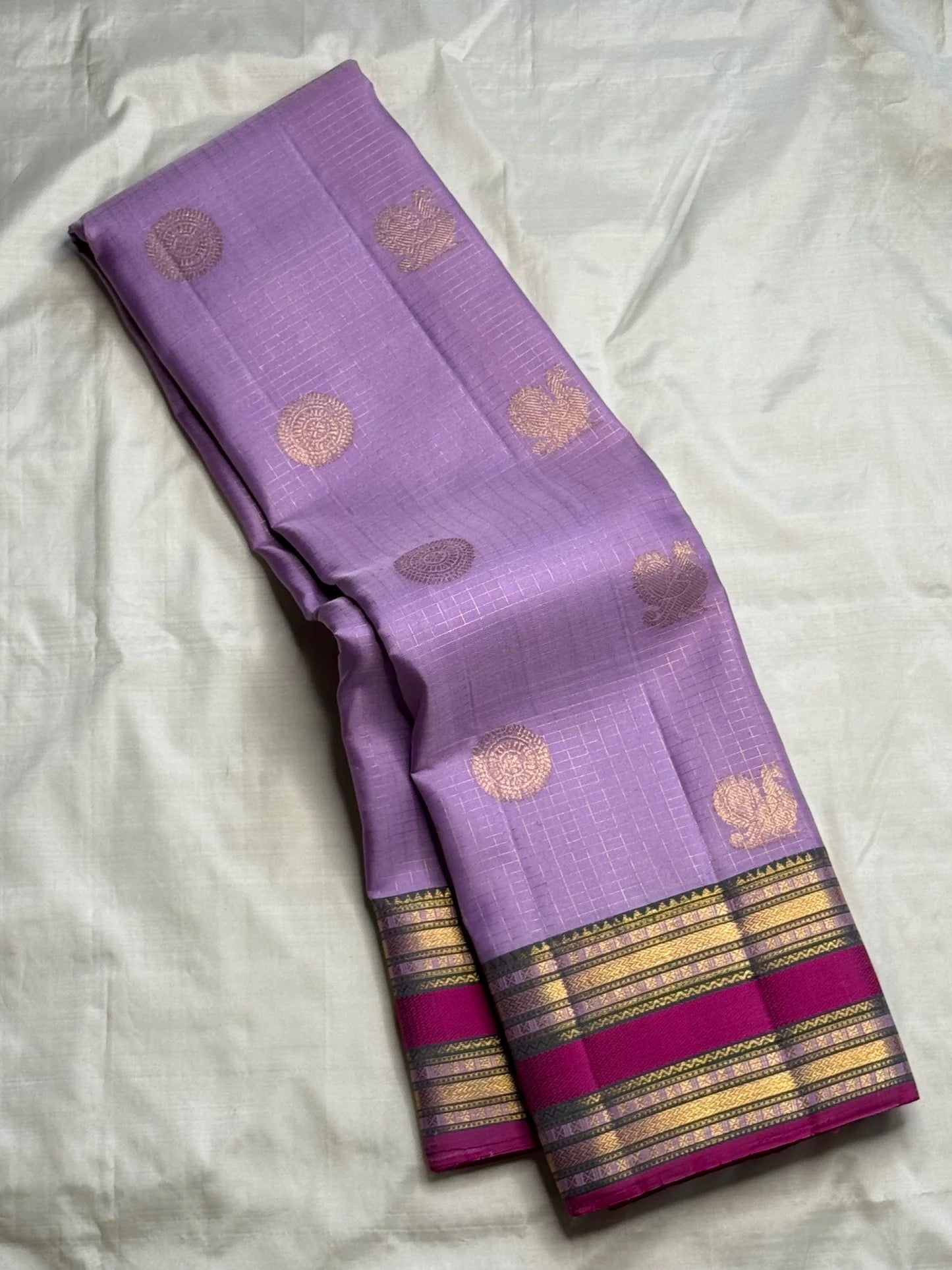 Full view of radiant lavender handwoven Kanchipuram pure silk saree with zari kattam and silk thread butta — Idam Living