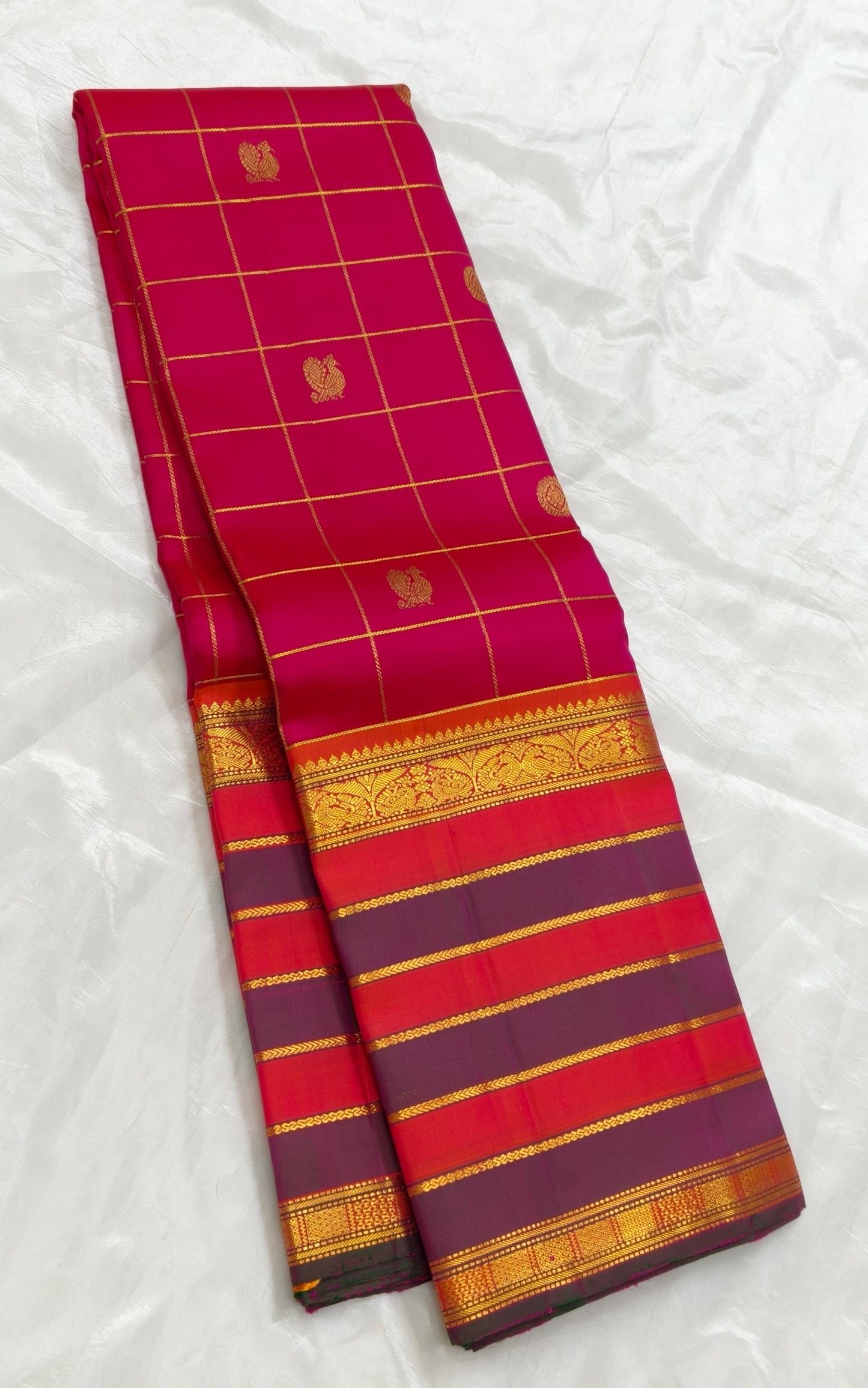 Raspberry pink Kanjivaram silk saree with mayil chakram butta – full length view