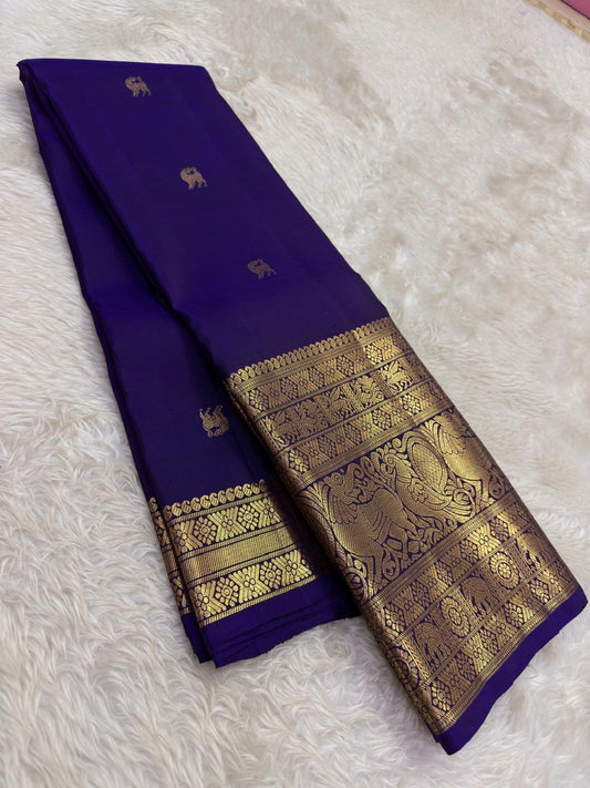 Handwoven Kanjeevaram saree featuring sapphire blue body with traditional heritage Yazhi butta motifs