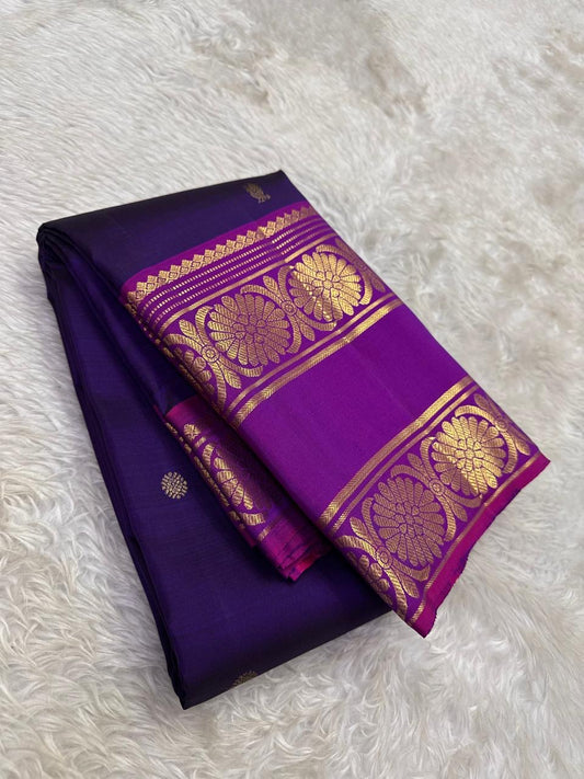 Handwoven royal purple Kanchipuram silk saree body close-up