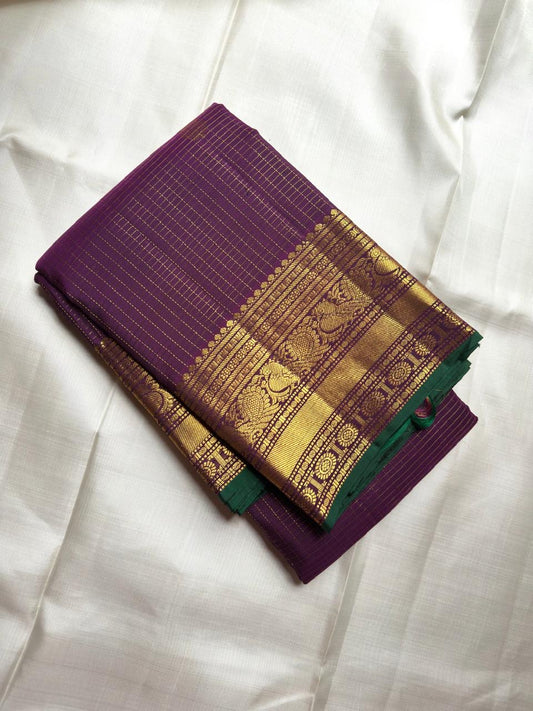 Royal Purple Handwoven Pure Silk Kanchipuram Saree with Zari Kattam and Mayil Butta Rudhraksham Border