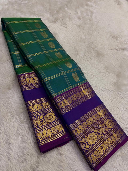 Kanchipattu silk saree in peacock green with royal purple border Varisaipet Korvai weave traditional zari detail