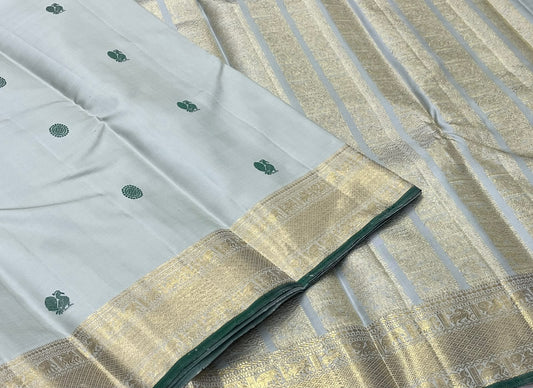 Sage green pure silk Kanjivaram saree with 2gm zari butta and temple border — Idam Living