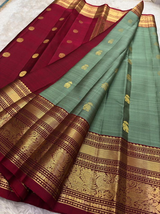 Sage green and burgundy red pure silk Kanchipuram saree – traditional wedding drape with gold zari