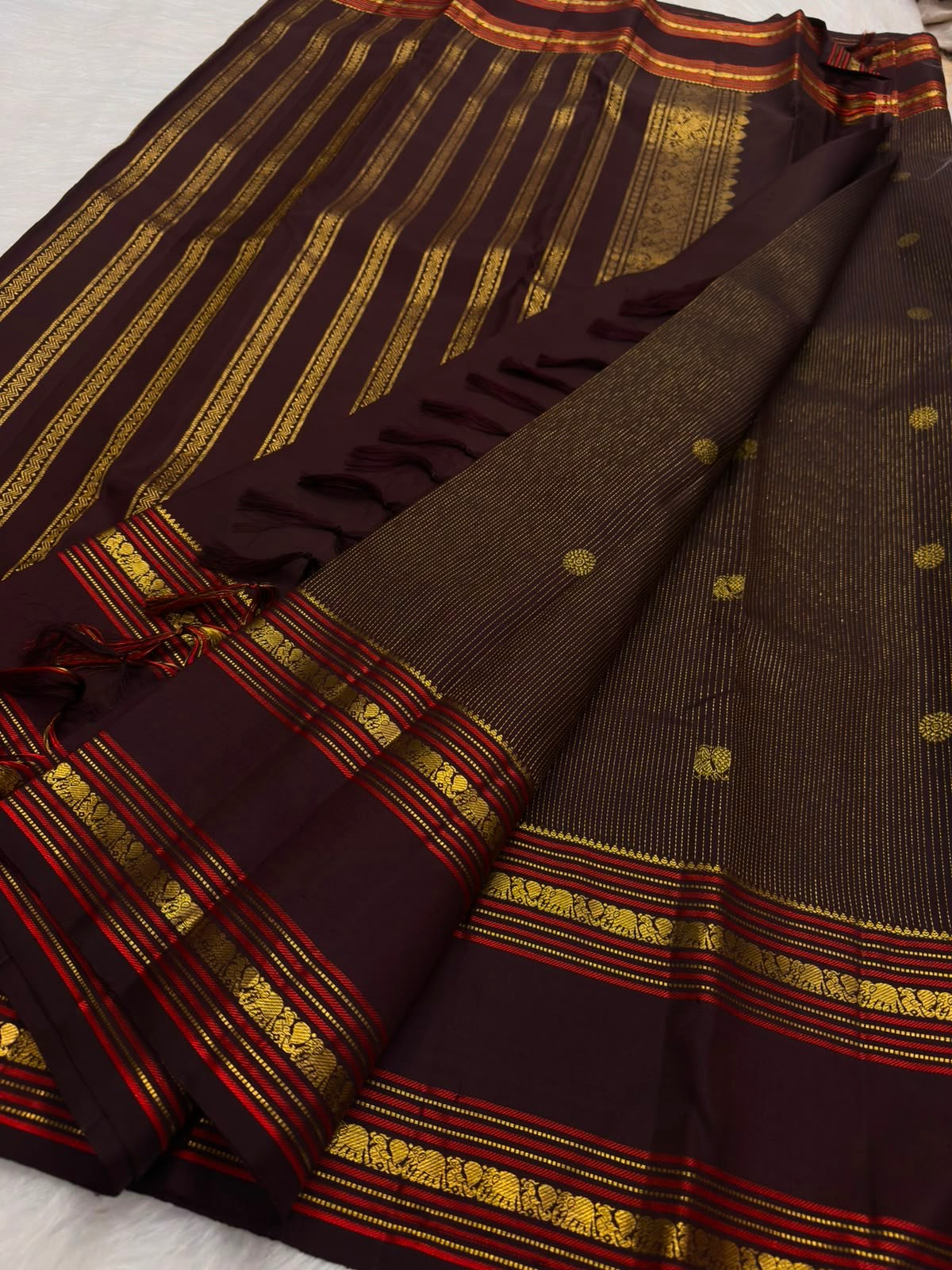 Handwoven Deep Kaapi Maroon Kanchipuram silk saree, zari texture, Mayil Chakram zari medallions