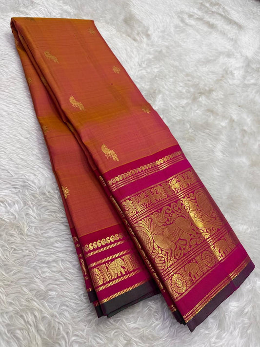 Sunset Amber Korvai Kanchipuram Silk Saree With Vanasringaram Border
