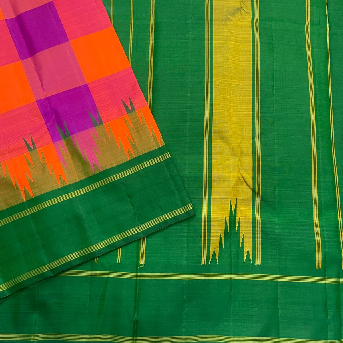 Sunset orange and violet Kanchipuram silk saree with Maragatham green pallu