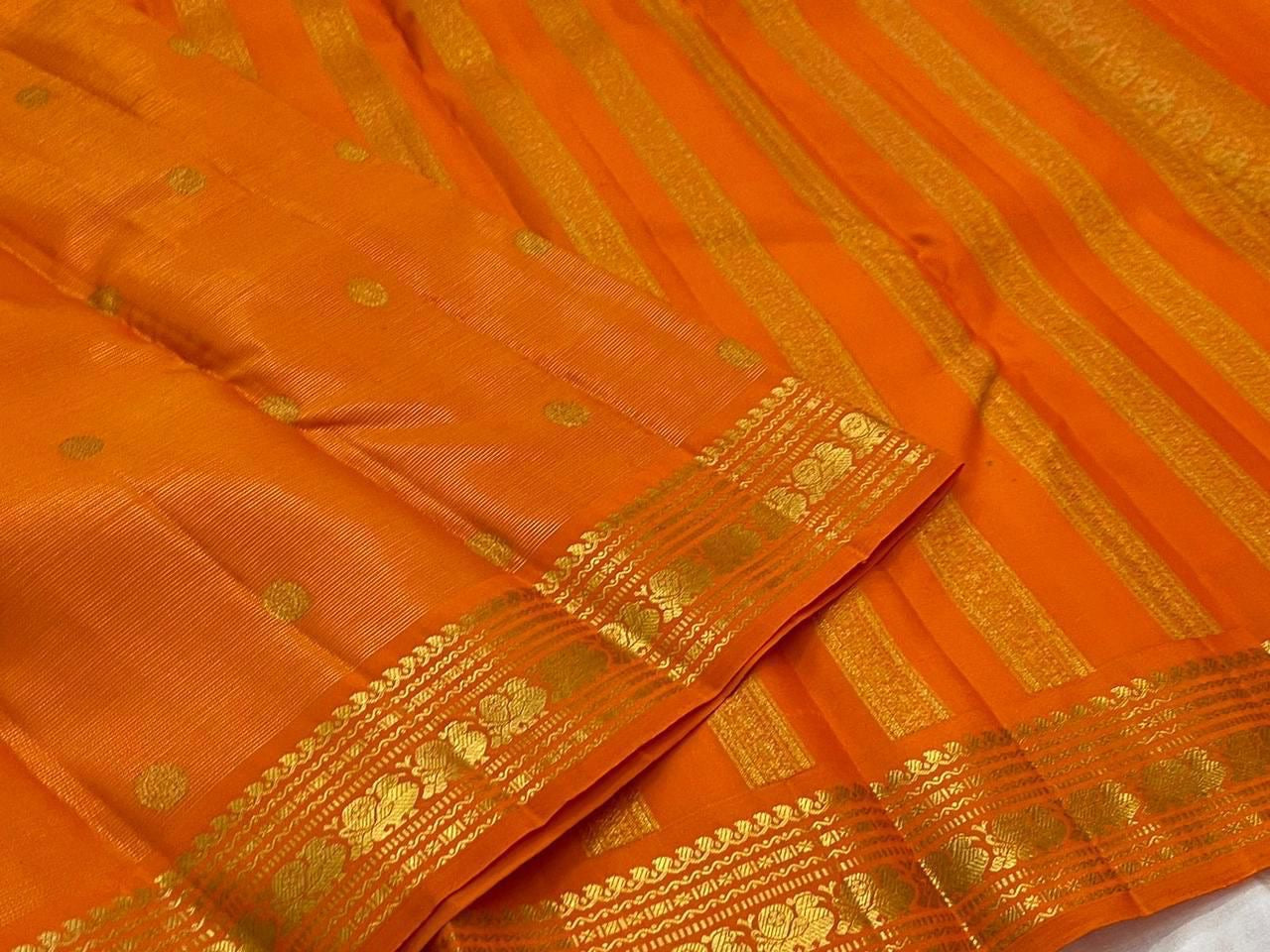 Tangerine Handwoven Pure Silk Kanjipuram Saree with Vairaoosi Zari Body and Kamalam Butta Border