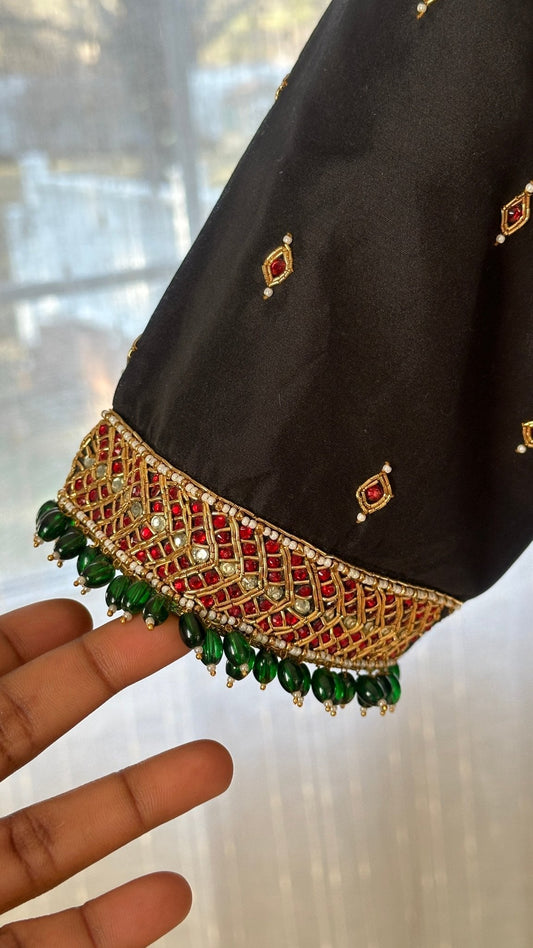 Made-to-measure black silk cotton Tanjore blouse designed as a statement jewelry piece