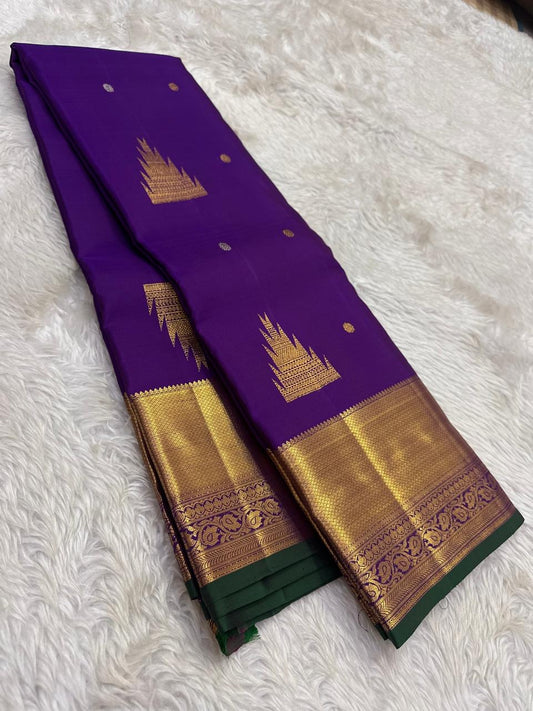 Pure Kanjivaram silk saree in imperial violet with forest green selvedge and gold zari