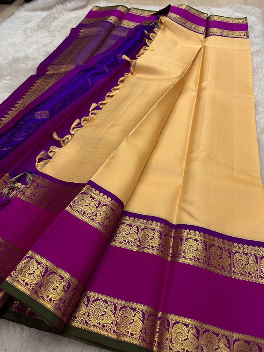 Warm ivory beige Kanchipuram silk saree antique gold zari detail closeup — Idam Living